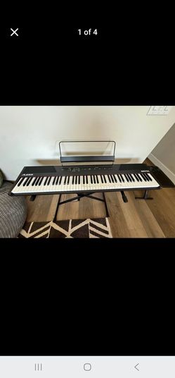 ALESIS RECITAL Weighted keyboard number of keys 88 come with stand & power cord  & chear work excellent is like new