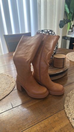 Below the knee, tall boots brand new