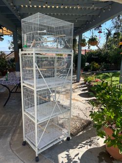 5 bird cages with stand