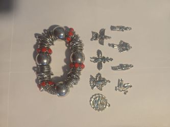 Silvertone bracelet and charms.