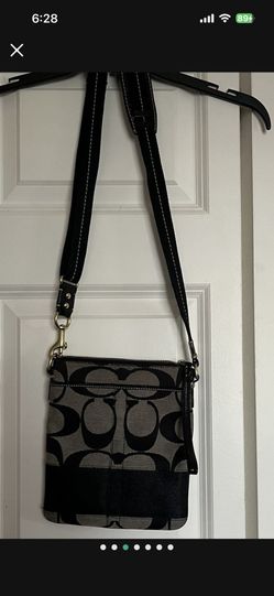 It’s A Beautiful Cross, Body Bag Made By Coach The Color Is Black And Grey