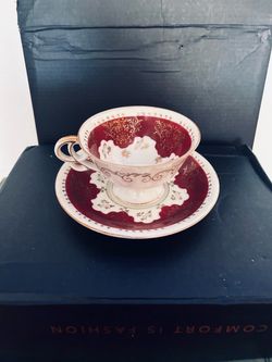 Antique Porcelain Tea Cup and Saucer