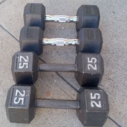 Two Sets Of Dumbbells 25 Lb 15 Lb