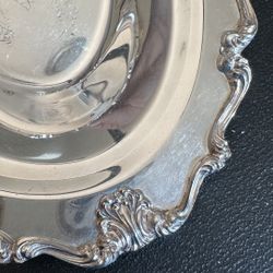 Enhance your dining experience with this elegant silver plated serving tray. Perfect for any occasion.
