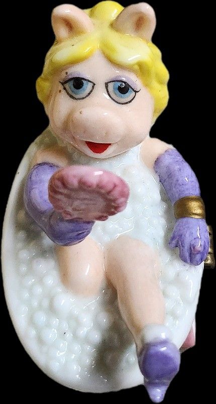 Miss Piggy trinket box from the Muppets franchise, specifically depicting her in a bubble bath