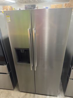LG refrigerator and freezer in good condition retail price $1300 my price $850