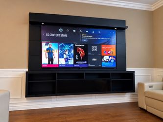 LG Smart 3D TV 70” + Large Black Entertainment Center