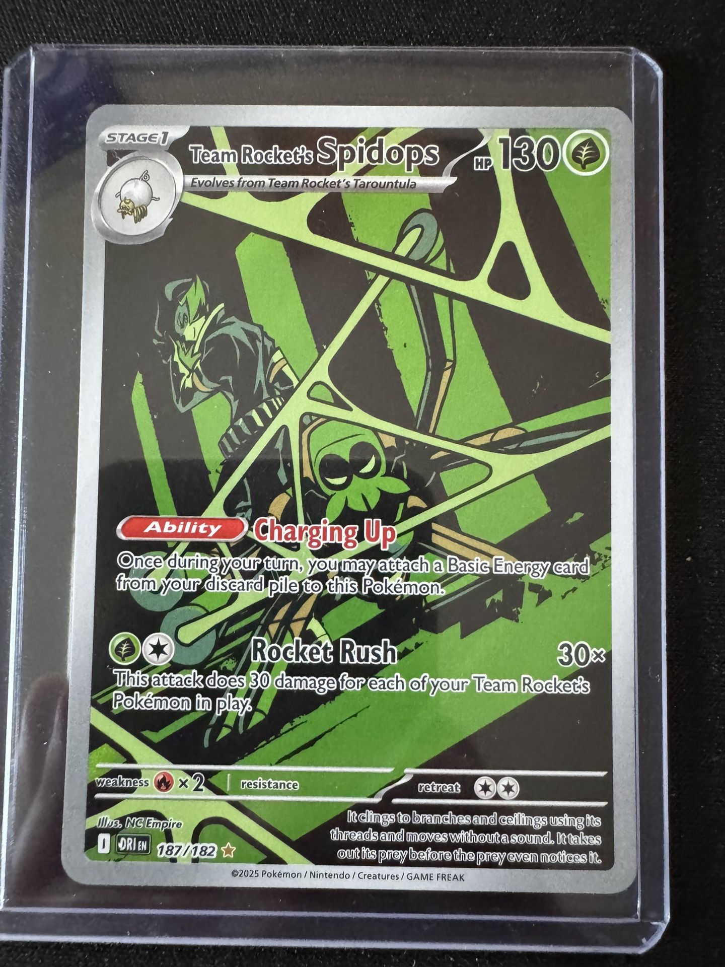 Team Rocket’s Spidops Pokemon Card - DRI 187/182