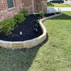 STONE WORK/FLOWER BEDS