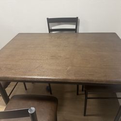 Fairly New Wooden Table With Chairs