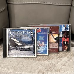 CHRISTMAS VINTAGE MUSICAL CDS - SET OF FOUR