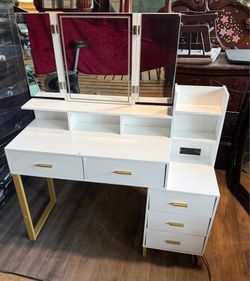 Vanity Desk features a white finish, gold-toned metal legs