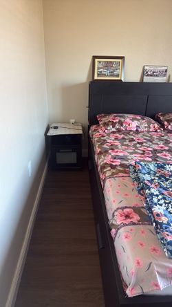 Queen bed with mattress and side tables
