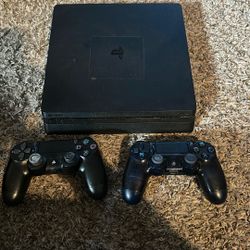 PS4 And 2 Controllers 