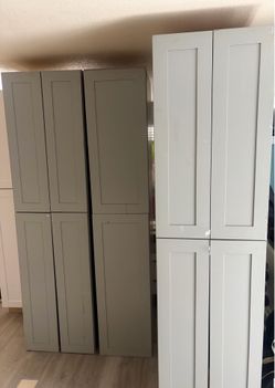 3 grey pantry cabinets