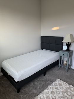 New Twin Bed With Padded Headboard And Memory Foam Mattresses And Side Table