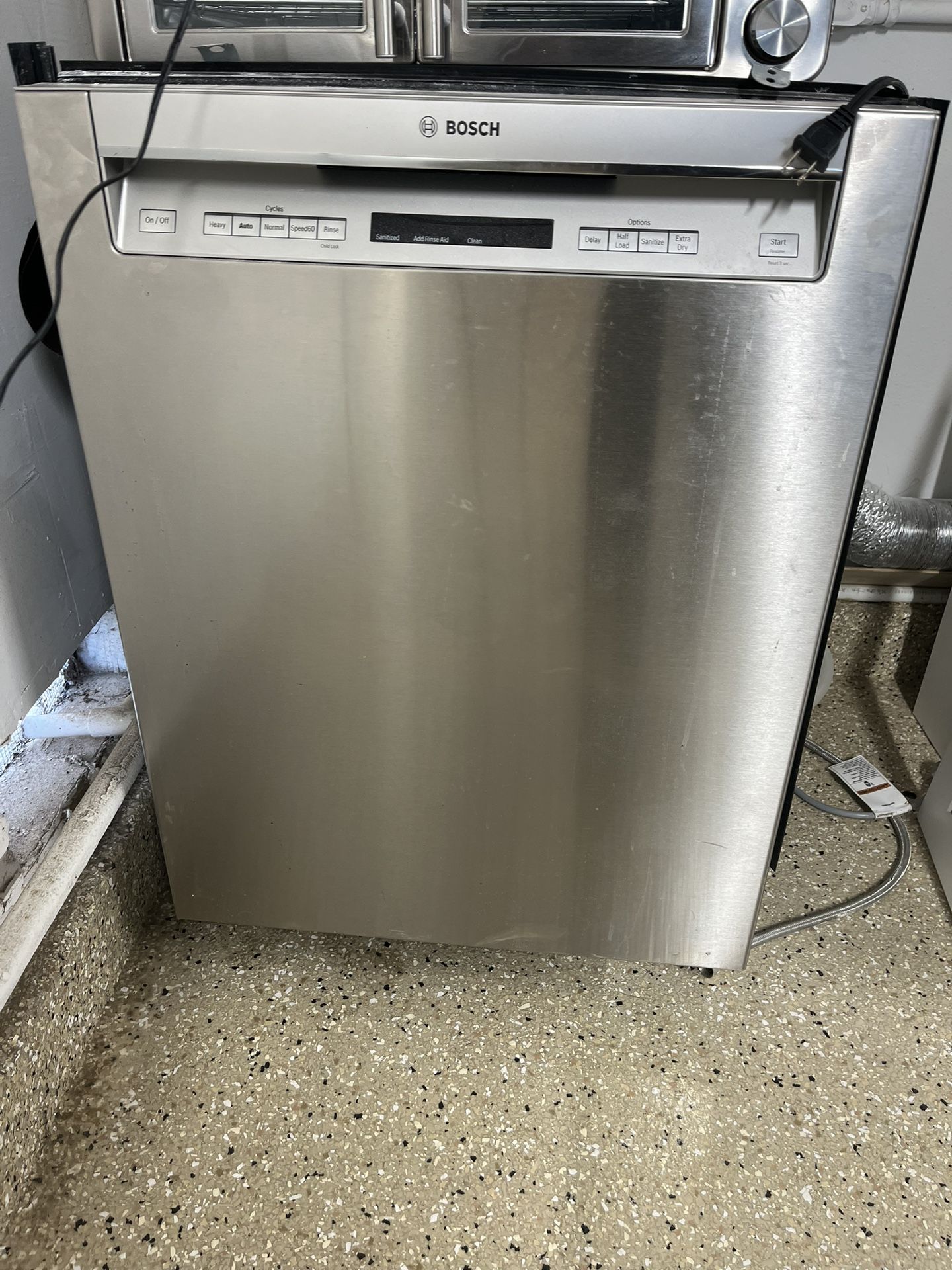 Bosch dishwasher , GE Stove & Airetta Wall vent