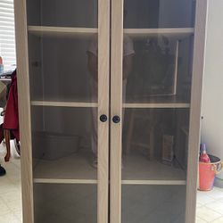 Bookcase or display cabinet with glass doors