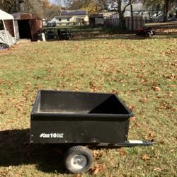 Tow behind dump wagon