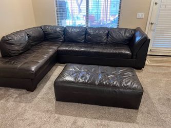 Leather sectional with queen bed sleeper