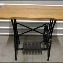 Antique sewing machine table