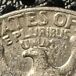 1984 Quarter Struck Through Grease 