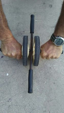 Exercise equipment/ Abs cruncher, thigh master, ab wheel