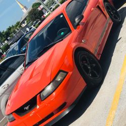 2004 Orange Ford Mustang V6 - Clean Title