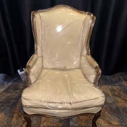 Vintage Beige Chair Protected With Plastic Cover 