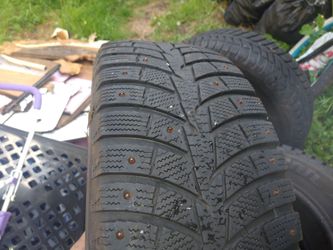 4 used studded tires