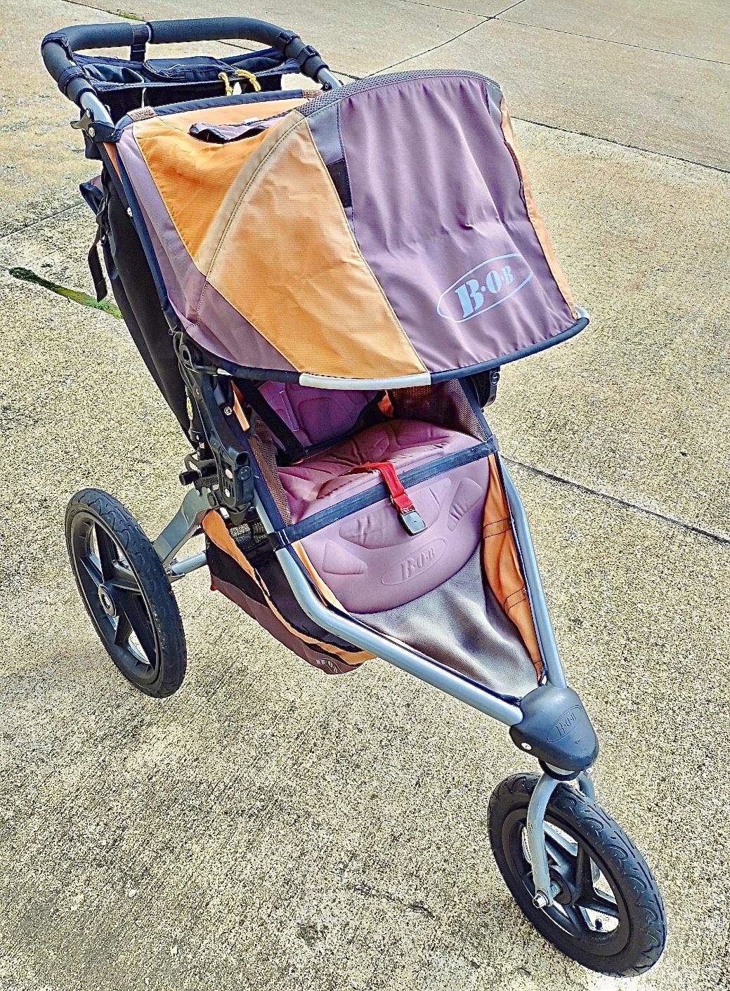 Used BOB Revolution Jogging Stroller - Orange and Gray