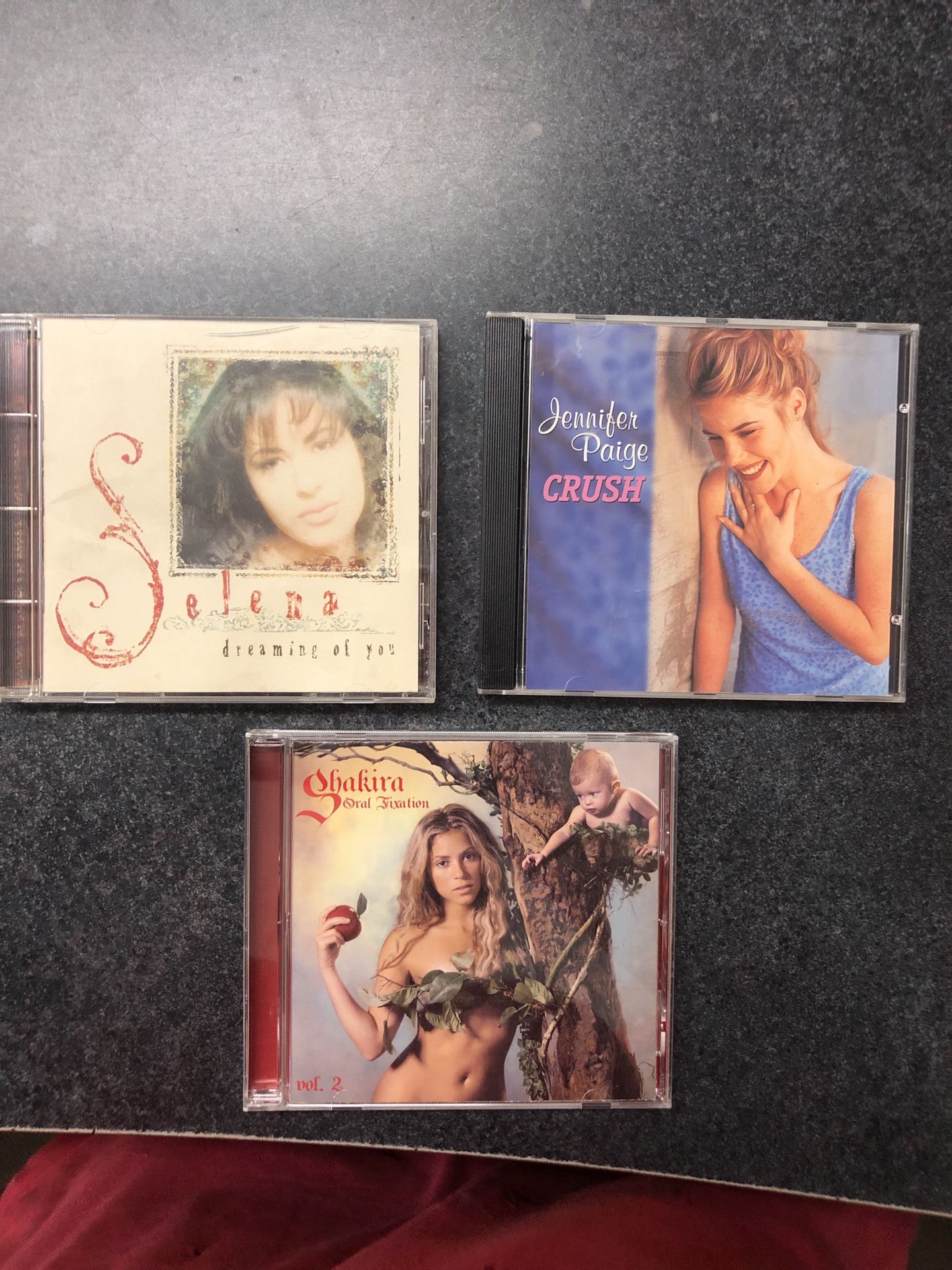 Selena, Jennifer Page, Shakira CDS as pictured