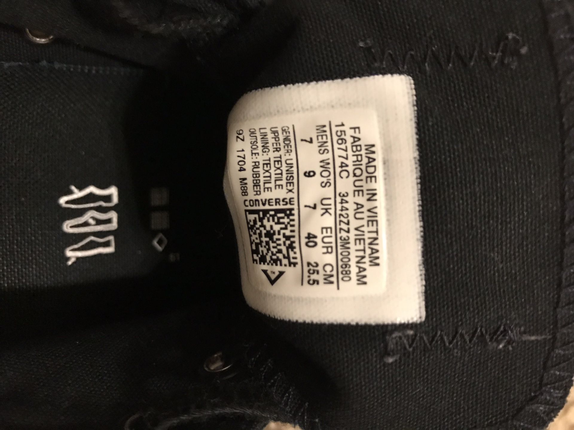 Black Converse with silver rubber