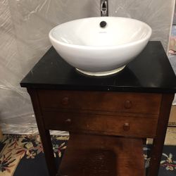 Bathroom vanity with faucet