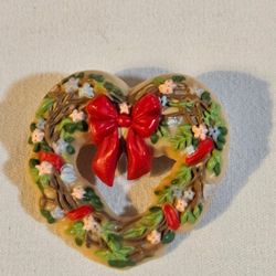 Hallmark Valentine heart-shaped wreath brooch wreath design with small pink and blue flowers, green leaves, and a red bow 1985 Excellent Vintage Condi