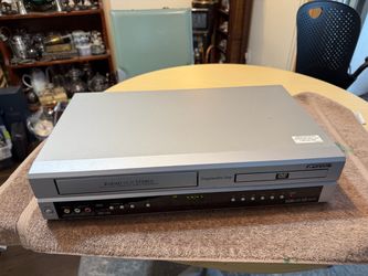 Up for sale is a Sansui VRDVD4001 Dual Deck DVD Player & VCR Combo. Manufactured in February 2004, this unit allows you to enjoy both classic VHS tape