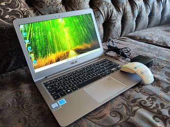 Laptop Asus UX330u-core i5-8gb ram-128gb HD SSD solid good for stud-ents.