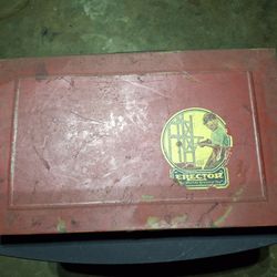 vintage A.C. Gilbert Erector Set housed in its original red metal carrying case, popular from the 1940s through the 1960s. These classic American toys