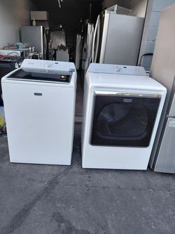 Pair of Maytag gas washing machines in good condition, 3-month warranty, we deliver