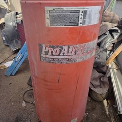 Air Tanks Red One Is 60 Gallons..Gray Is 50 Gallons 