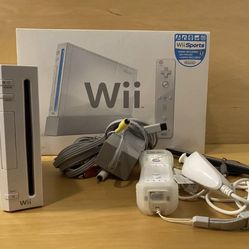 NINTENDO WII + 150 WII GAMES INCLUDED