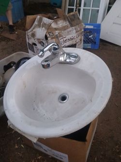 bathroom s ink with fausets