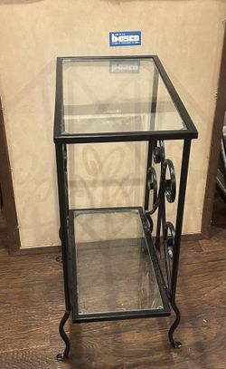 Small Side Table With Glass The Top And Bottom Area 