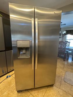 Whirpool 2 door side by side steinless steel refrigerator