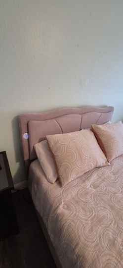 Rose color full size bed with led lights and drawers underneath