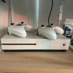 Xbox one with controllers and games