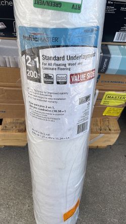New TrafficMaster 2-in-1 standard underlayment for all floating wood and laminate flooring. This roll covers 200 square feet and has a 2 mm thickness 