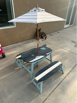 Kids table with umbrella