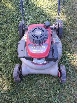 Craftsman push mower. Honda engine. Just dirty.