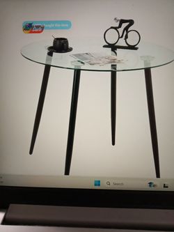 2 simular to this image Ikea tempered glass dining tables